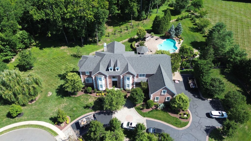 Roof replacement in Monroe Township, NJ with Owens Corning TruDefinition Duration shingles in Williamsburg Gray